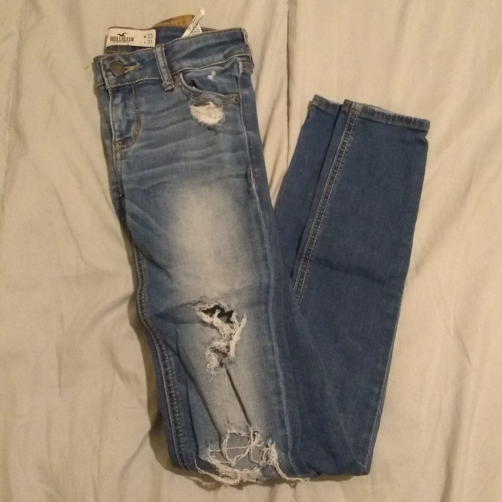 blue ripped jeans.